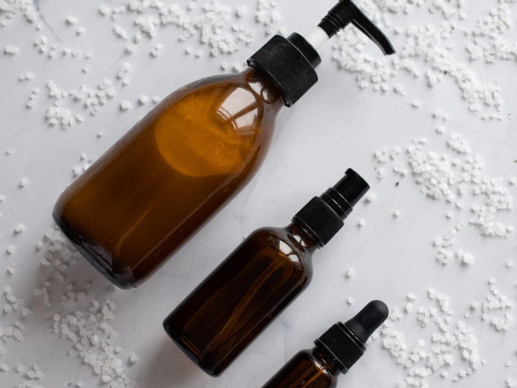 Set of skincare products placed on white table