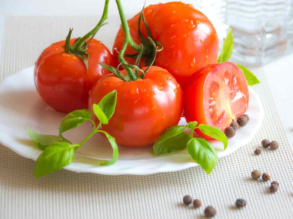 Tomato Top of White Ceramic Plate