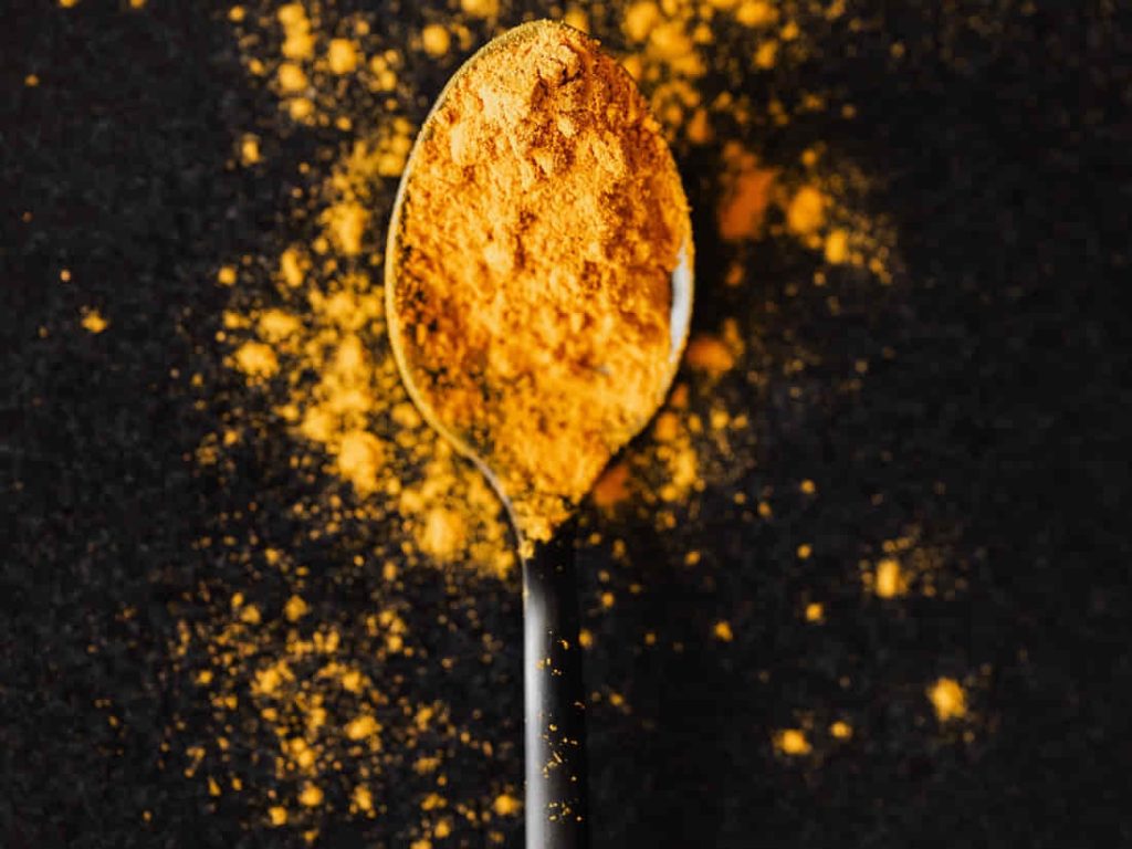 turmeric on spoon