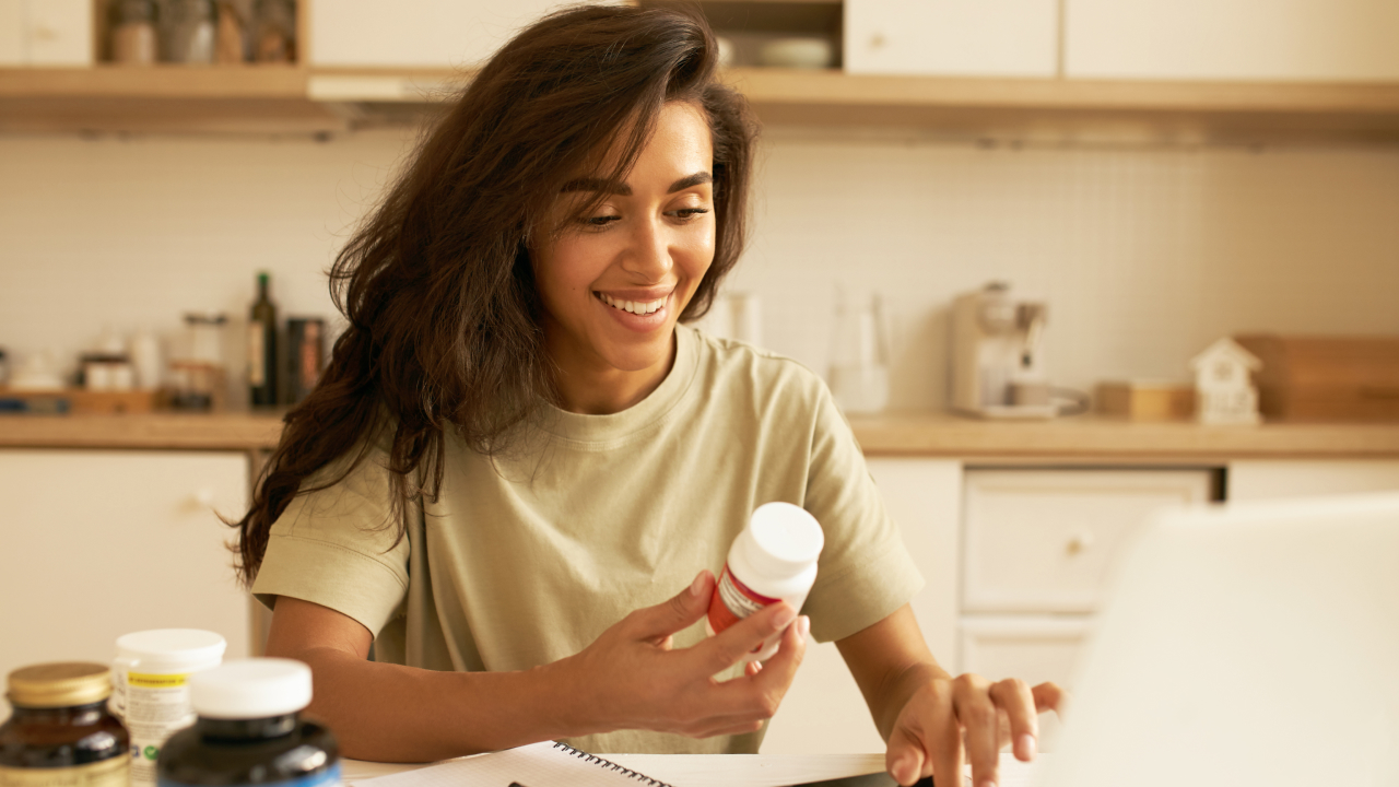 A young holding vitamins